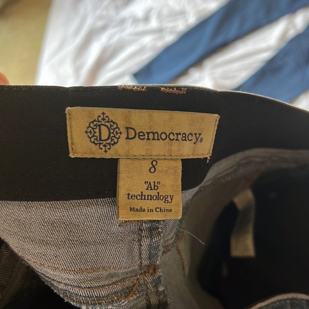 Democracy jeans unfinished bottom and technology